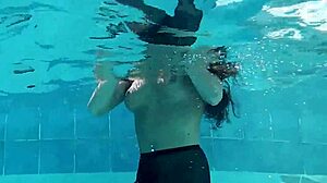 High definition photography of naked European superstar Diana Kalgotkina doing swimming