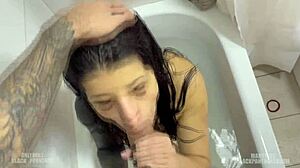 In a bath a young Latina beauty gets a shower of urine and semen