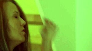 A super sexy young girl passionately floods herself with water