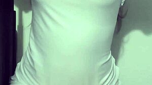 Young Japanese college girl with small breasts shows her assets in a wet t-shirt