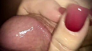 Hot girl masturbates a big cock