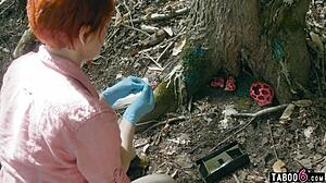 A scientist observes a hot scene of two people having sex outside