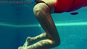Kittina Ivory strips in the pool in a public sex act